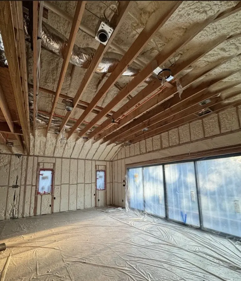 Interior walls and ceiling insulated with spray foam during new construction in Guntersville